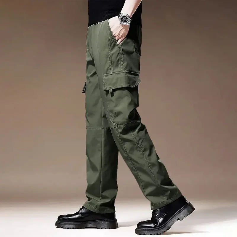 بنطلون رياضي رجالي فضفاض بجيوب كبيرة، مناسب للربيع والصيف، مناسب للجري والأنشطة الخارجية، بخصر مطاطي.