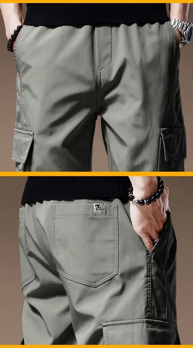 بنطلون رياضي رجالي فضفاض بجيوب كبيرة، مناسب للربيع والصيف، مناسب للجري والأنشطة الخارجية، بخصر مطاطي.