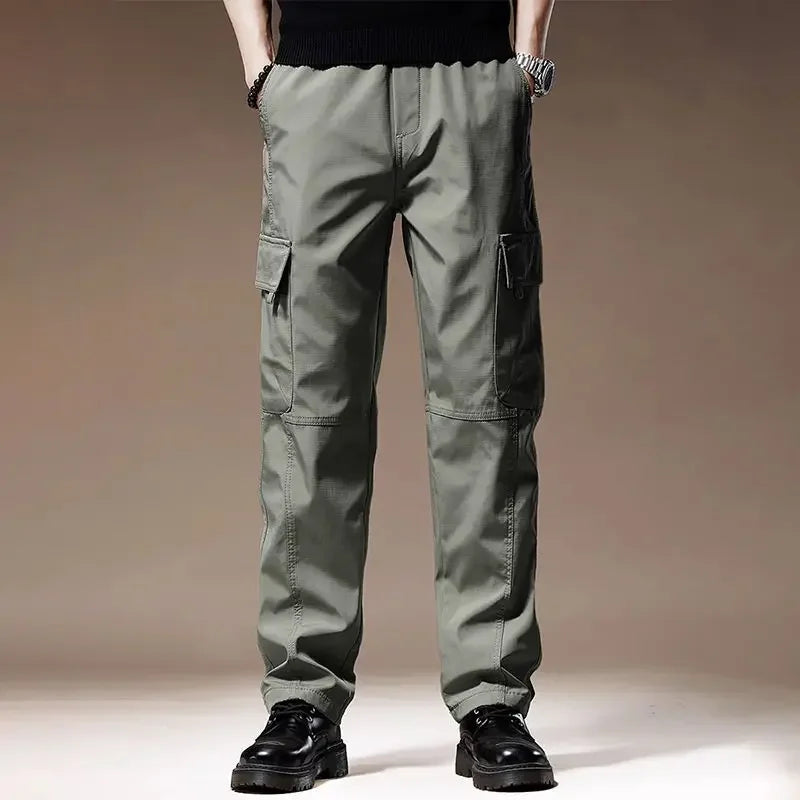 بنطلون رياضي رجالي فضفاض بجيوب كبيرة، مناسب للربيع والصيف، مناسب للجري والأنشطة الخارجية، بخصر مطاطي.